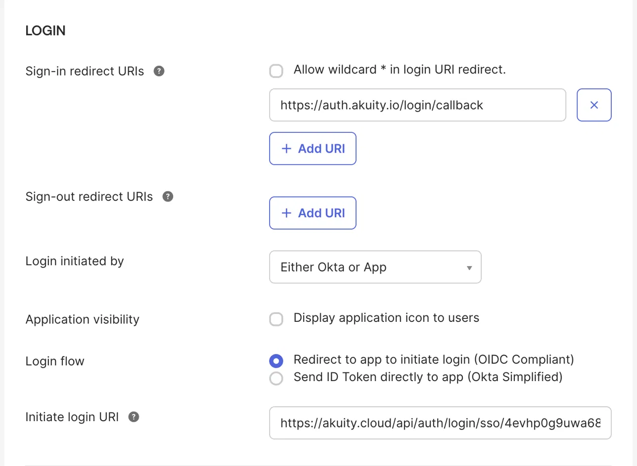 The application's LOGIN section, with Login initiated by set to Either Okta or App and the initiate login URI filled in